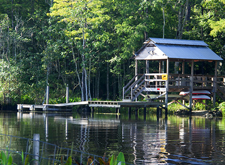 Tall boathouse with dock