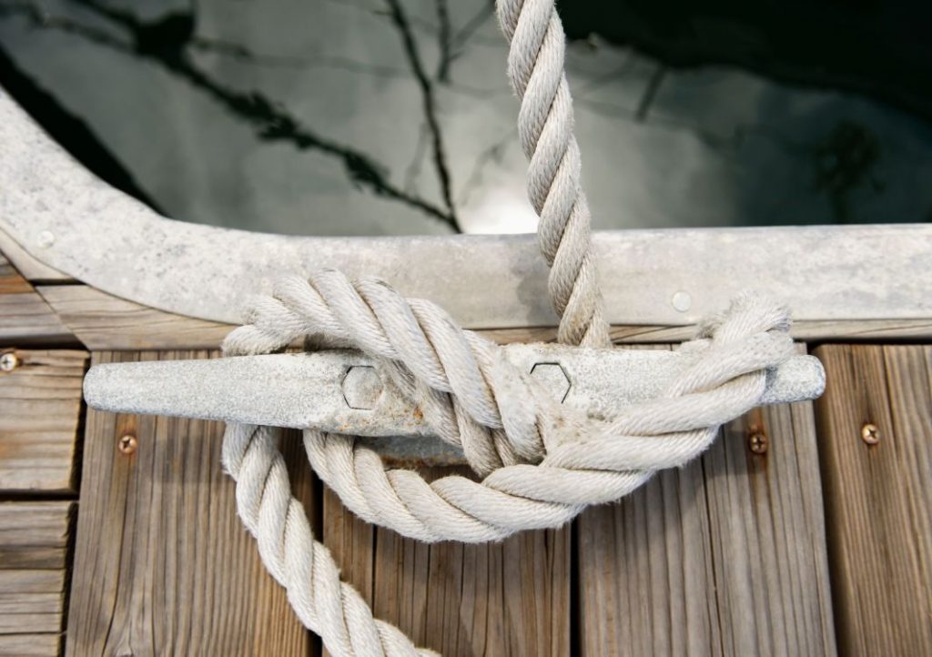 Dock cleat with rope