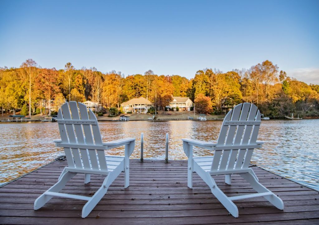 White Adirondack chairs as boat dock accessories