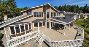 Large wooden walkout deck of luxury suburban house