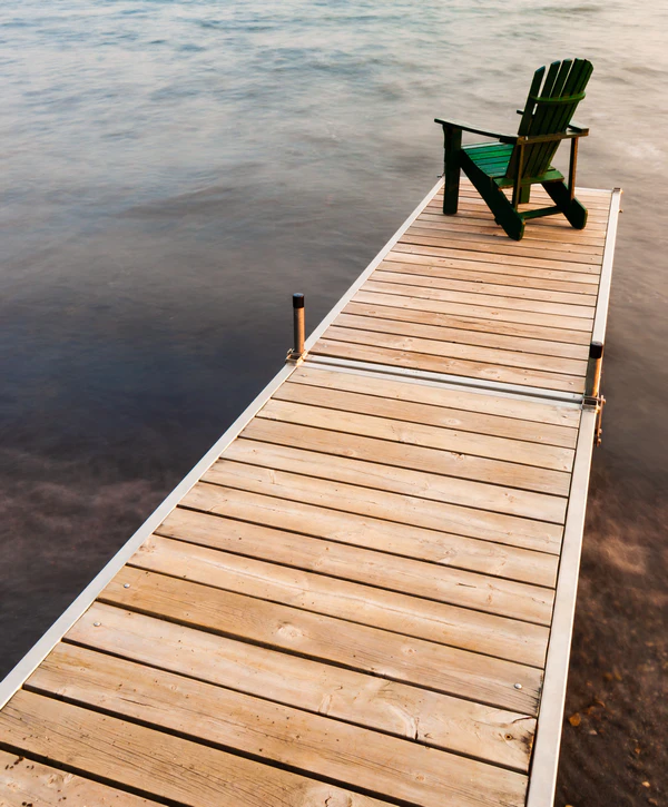 A stunning high-end residential waterfront dock featuring modern construction design in Fayetteville, NC.